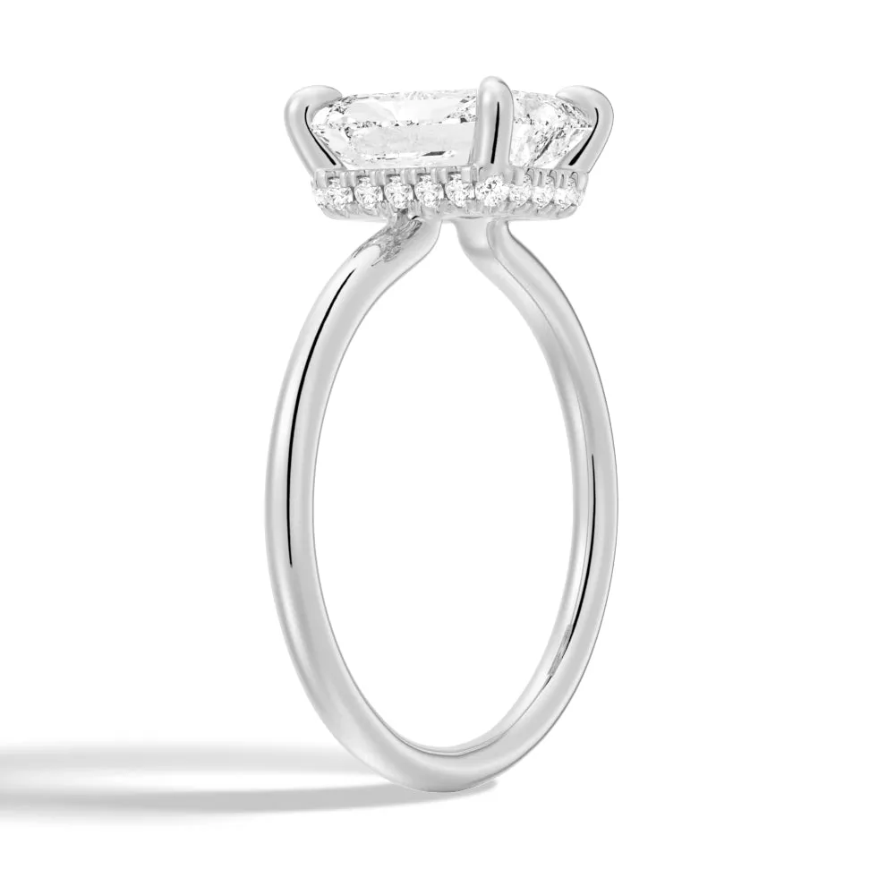 Four-Prong Solitaire Radiant Cut Engagement Ring With Hidden Halo