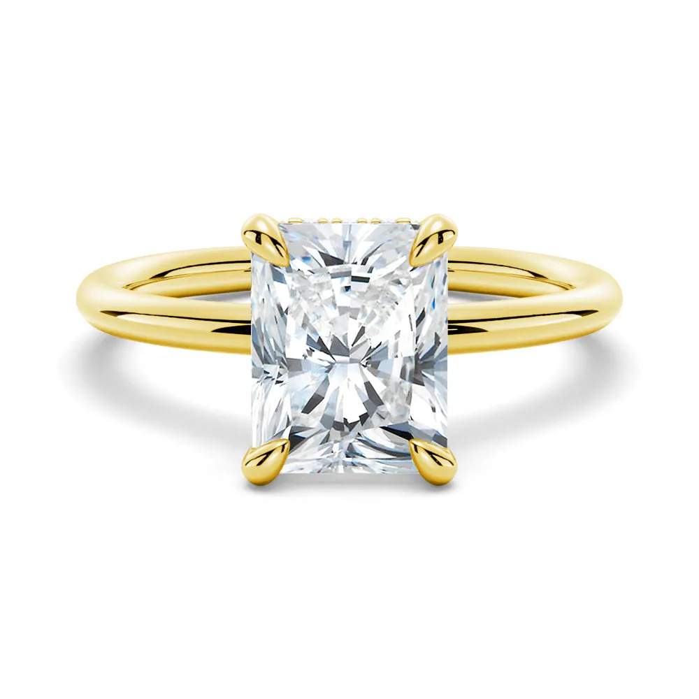 Four-Prong Solitaire Radiant Cut Engagement Ring With Hidden Halo